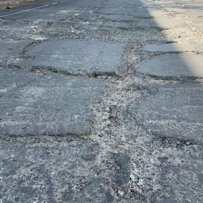 城南路面起砂露石子修补料